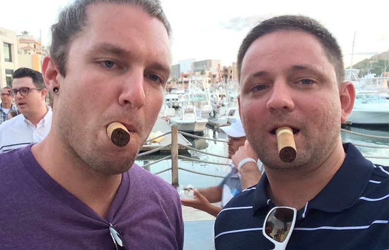 Hey, it's hard to smile with a cigar in your mouth!