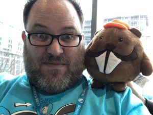 People at WordCamp US with stuffed beavers.