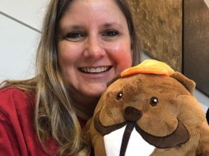 People at WordCamp US with stuffed beavers.