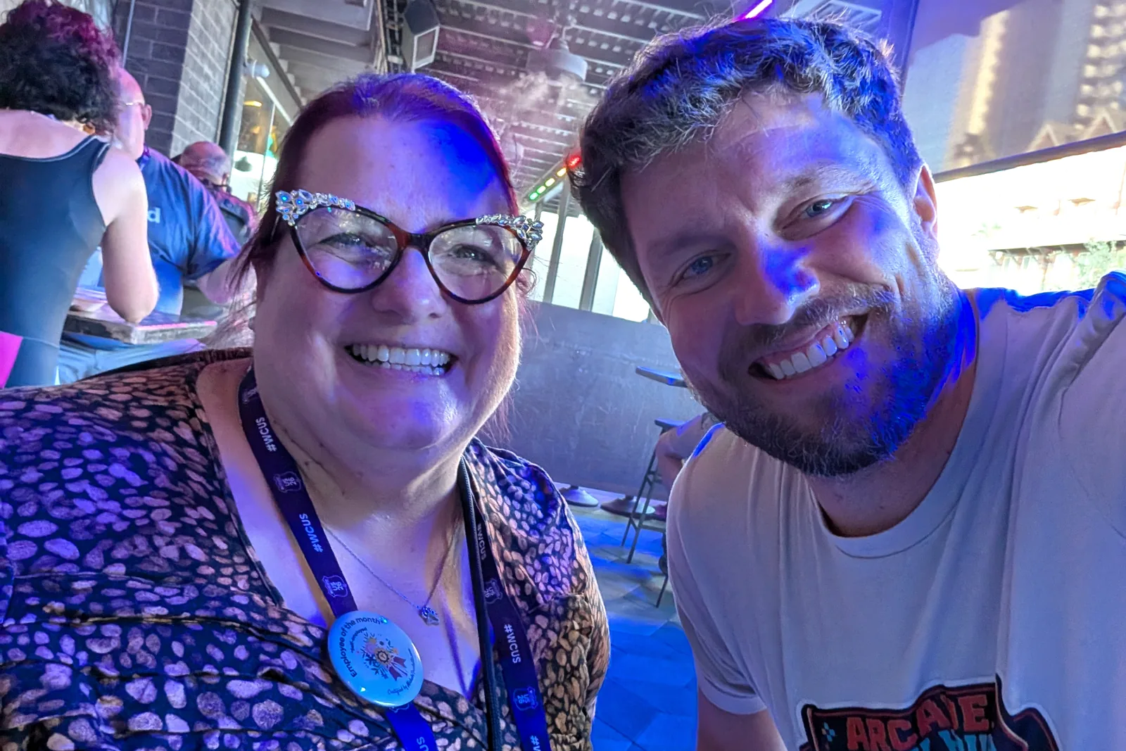 Robby and Michelle Frechette smiling together at the Beaver Builder arcade after-party during WordCamp US 2026.