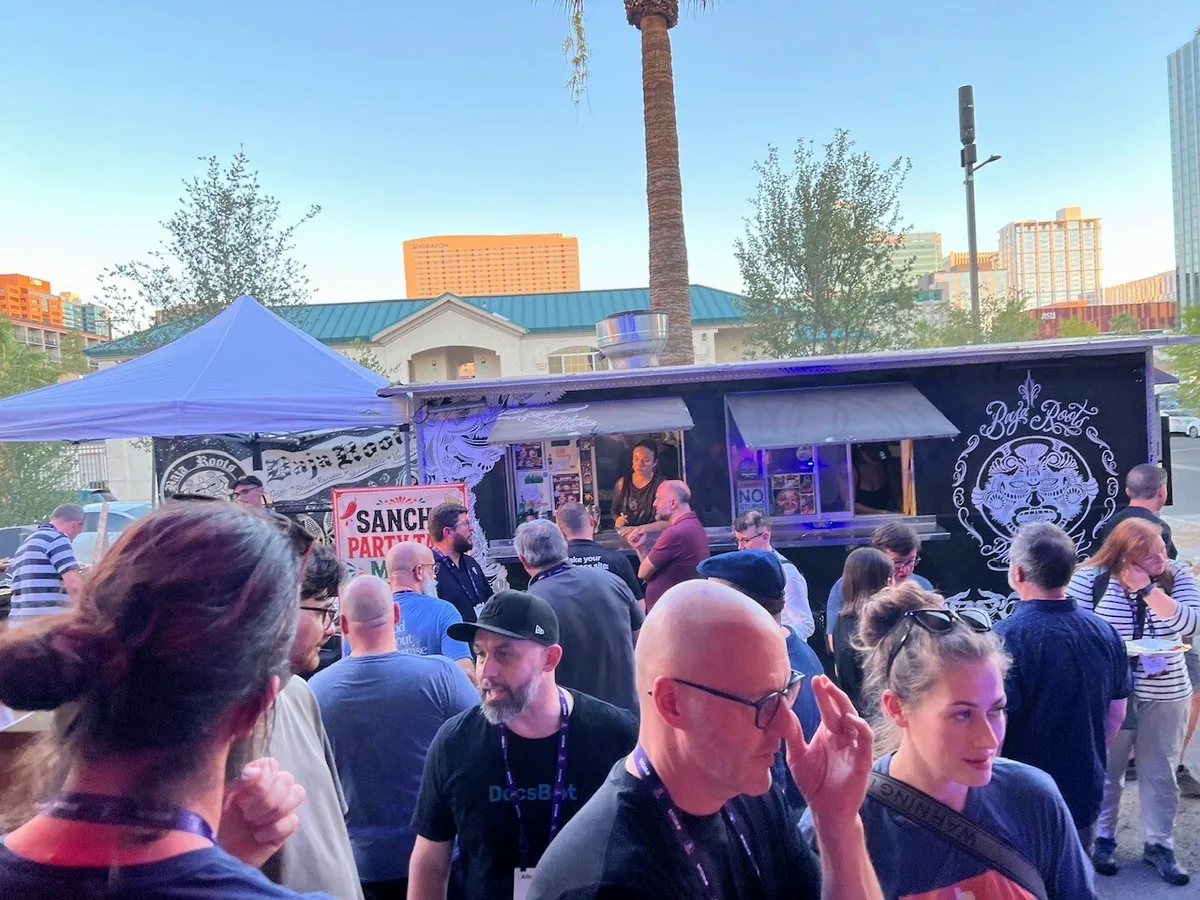 WordCamp US attendees gathering around a food truck at the Beaver Builder after-party in Phoenix.